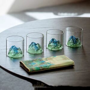 Glass cup with mountain design