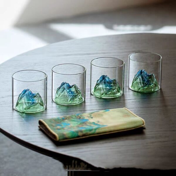 Glass cup with mountain design
