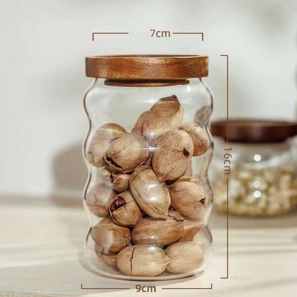 Curved glass storage jar